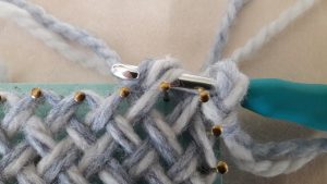 Yarn over the crochet hook