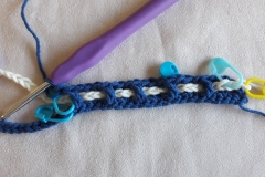 Crocheting and weaving until the first marker
